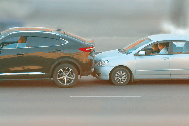 Two cars colliding in a fender bender