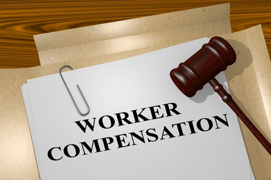 Worker compensation document packet with a gavel resting on top