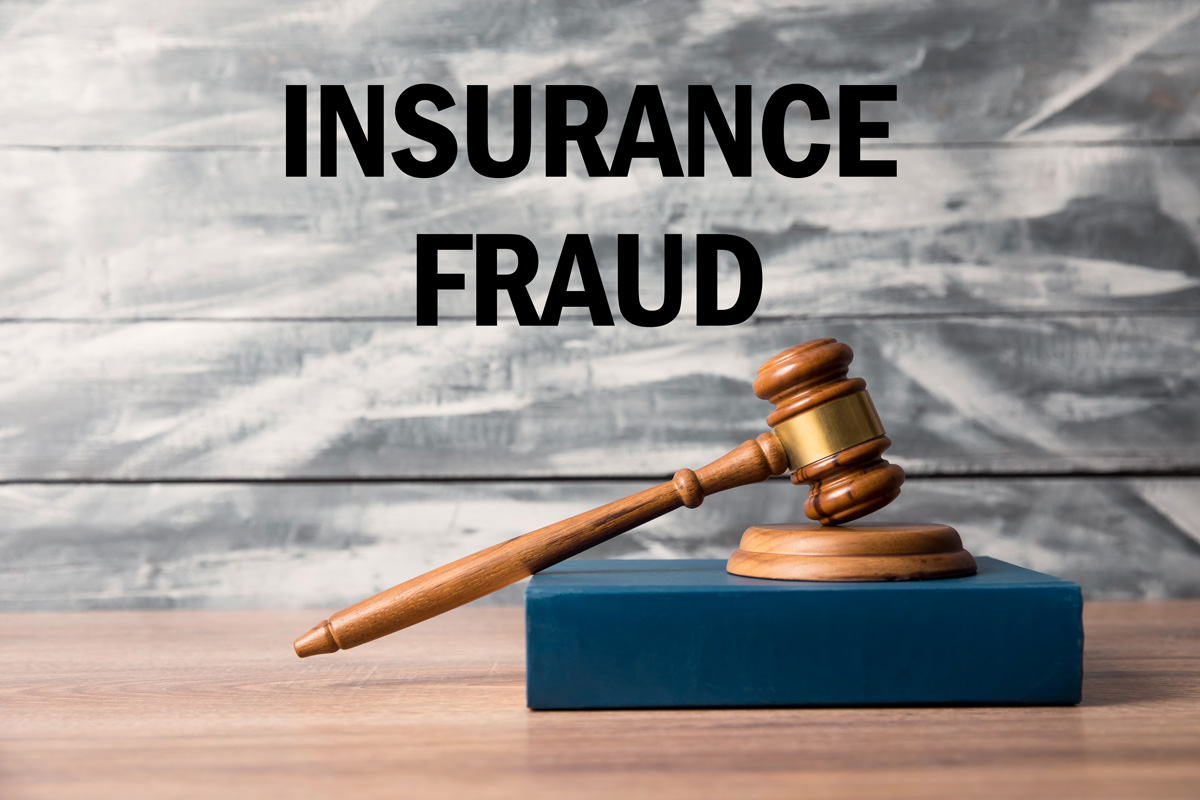 Insurance Fraud title over a gavel and block